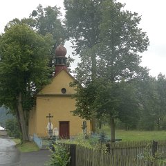 Local church hidden in linden trees