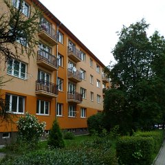 Typical apartment building in my old neighborhood. Except they were all grey when I lived there.