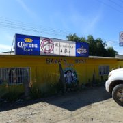 P1090588  After little early morning &#34;fun&#34; in the llantera we got to El Rosario ready to get some food. This bright yellow place had decent coffee (not Starbucks as the sign suggested) and eggs, and an old Baja expat from California who owns the place and tells some good stories
